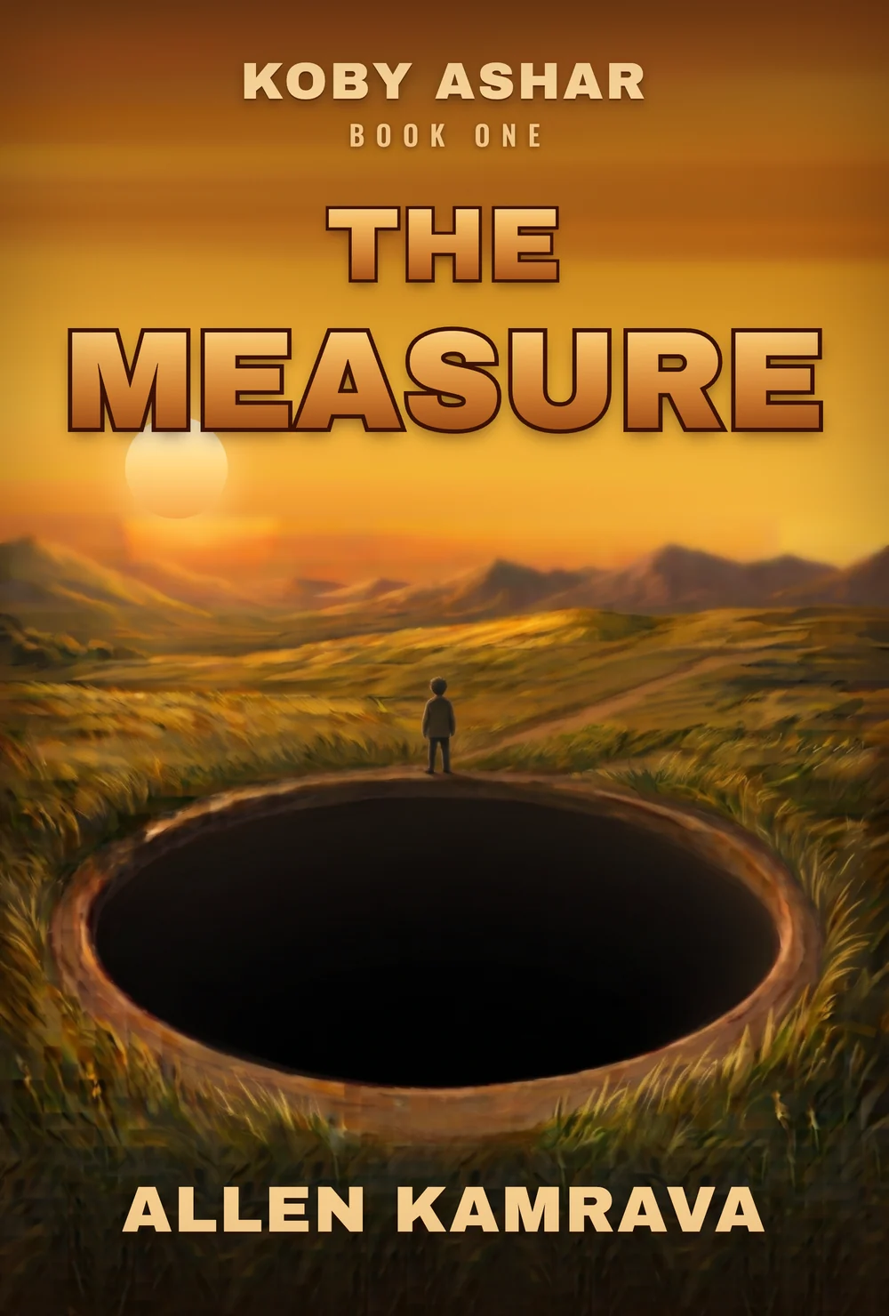 The cover of The Measure: a boy of about twelve stands at the lip of a wide, round hole cut clean through open grassland, looking down into the dark of it. Long grass either side, a track winding away over low hills, and one small pale sun low in a gold sky. The type reads Koby Ashar, Book One, The Measure, Allen Kamrava.